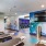 the green at 9&90 framingham apartments fitness center room with treadmills and surf artwork